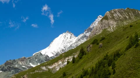 Clouds over alpine mountains time lapse Stock Footage 68910285