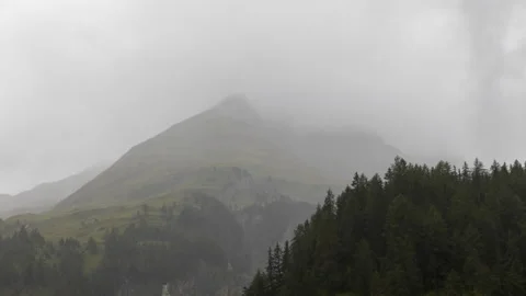 Clouds over alpine mountains time lapse Видео 140899862