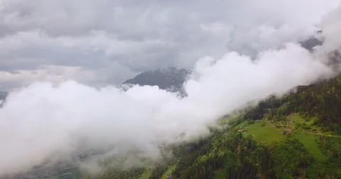 Clouds over Alps Aerial View Видео 90306351