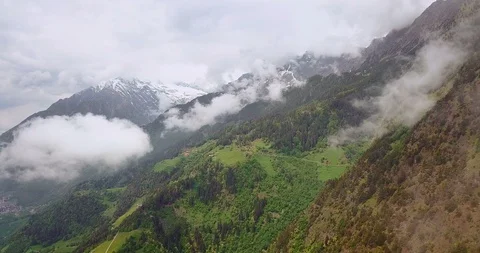 Clouds over Alps Aerial View Видео 90311469