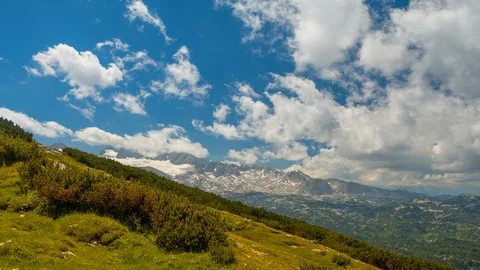 Clouds over the Alps. Time Lapse UHD Stock-Footage 106453976