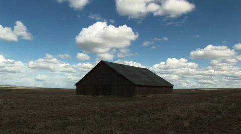 Clouds over barn time lapse Stock Footage 69660