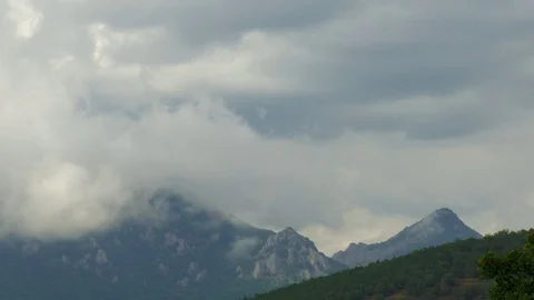 Clouds over blue mountains, time lapse Stock Footage 79448019