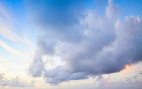Clouds over blue sky in summer morning Stock Photos