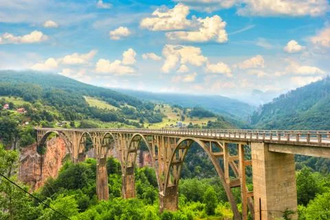Clouds over bridge Stock Photos