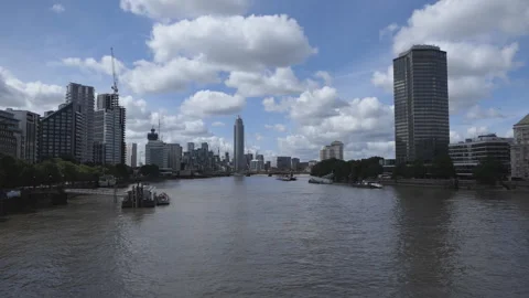 Clouds over buildings surrounding Thames River. Stock Footage 110654688