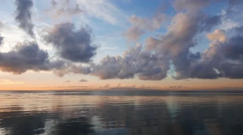 Clouds over calm ocean Stock Footage 50628112