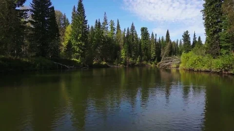 Clouds over calm river Stock Footage 81662922