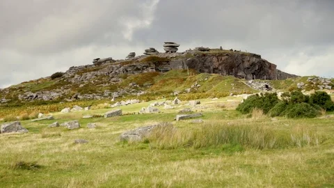 Clouds over the Cheesewring rocks on Bodmin Moor, Cornwall, England Stock Footage 115527268