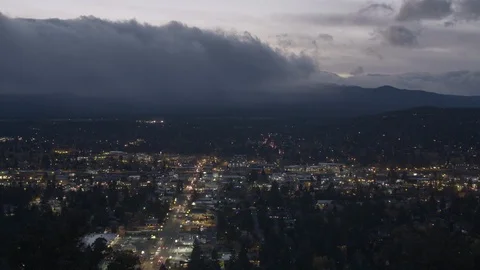 Clouds over the city in the evening Stock Footage 87612698