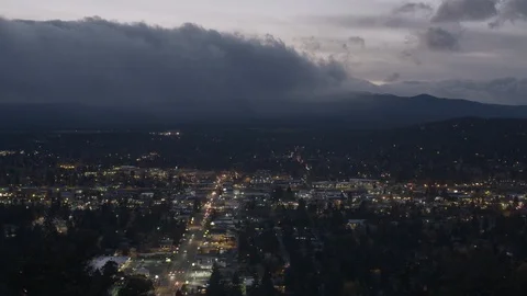 Clouds over the city in the evening Stock Footage 87612715