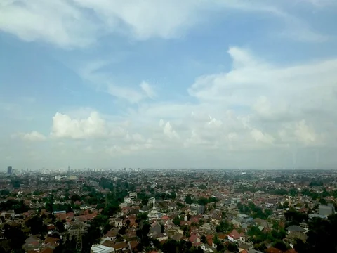 Clouds over the city of jakarta Video stock 124513087