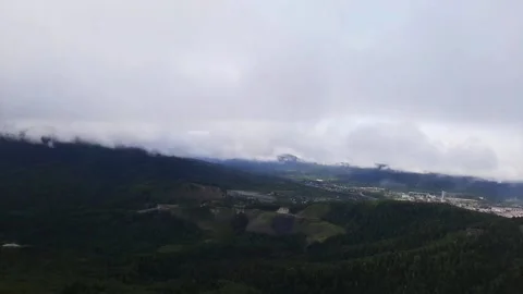 Clouds over city in the mountains Stock-Footage 169774923
