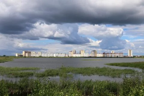 Clouds over the city Stock Photos