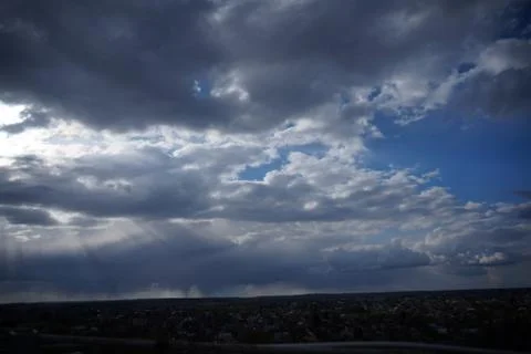 Clouds over the city Stock Photos