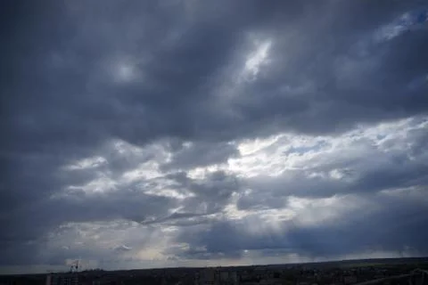 Clouds over the city Stock Photos