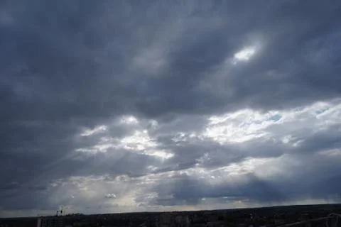 Clouds over the city Stock Photos