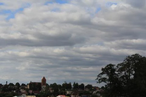 Clouds over the city Stock Photos