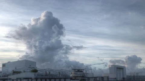 Clouds over city sunrise time lapse 060 Stock Footage 125393569