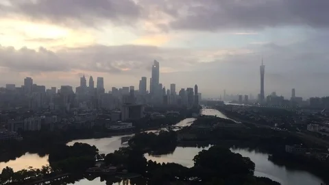 Clouds over cityscape of modern city Stock Footage 79321696