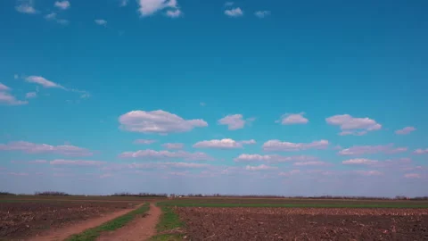 Clouds over countryside landscape, time lapse 스톡 동영상 173527439