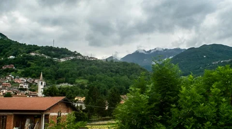 Clouds Over Countryside Town Timelapse Video stock 64176433