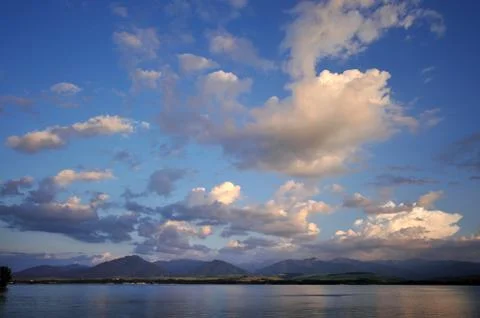 Clouds over dam Stock Photos