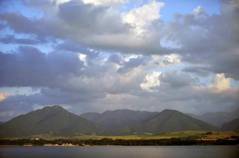 Clouds over dam Foto stock