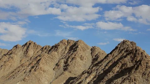 Clouds over desert mountains Stock Footage 96027514