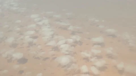 Clouds over the desert. View of the desert from above. Stock Footage 163993968