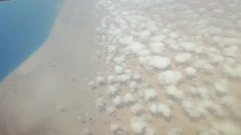 Clouds over the desert. View of the desert from above. Stock Footage 164652036