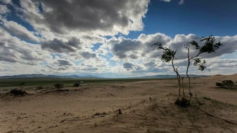 Clouds over a dune in the Gobi Desert, Mongolia.  Stock Footage 77152383