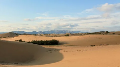 Clouds over a dune in the Gobi Desert, Mongolia.  Stock Footage 77153728