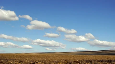 Clouds over the field Stock Footage