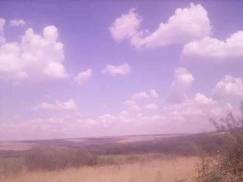 Clouds over the field Foto stock