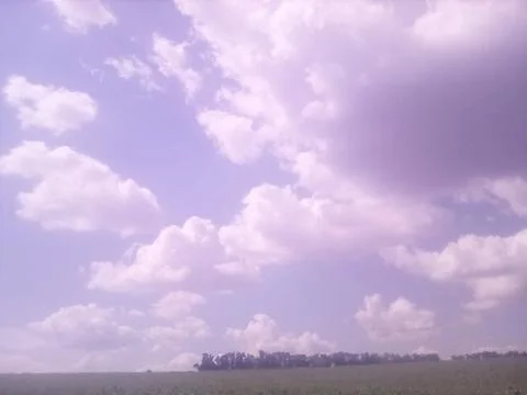 Clouds over the field Stock Photos