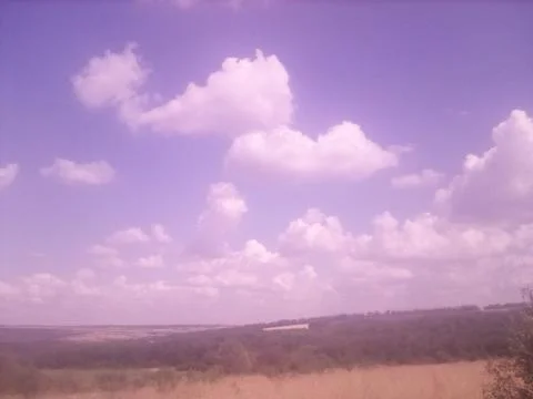 Clouds over the field Stock-Fotos