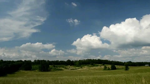 Clouds over a field timelapse Stock Footage 93781118