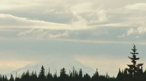 Clouds Over Forest and Mount Redoubt Stock Footage 11102918