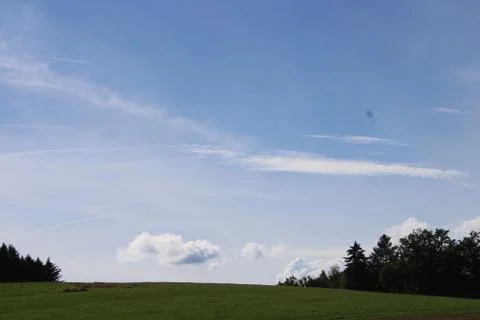 Clouds over a forest Stock Photos