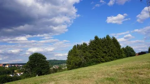Clouds over a friendly field Stock Photos