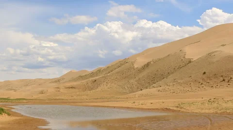 Clouds over the Gobi desert, dune Hongoryn, Mongolia. Full HD Video stock 68670837