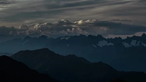 Clouds over the great mountain range ZoomIN Timelapse Stock-Footage 87323494