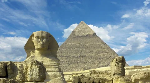 Clouds over great pyramid and sphinx in Egypt - timelapse Stock Footage