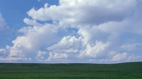 Clouds over the green field Stock Footage 63513552