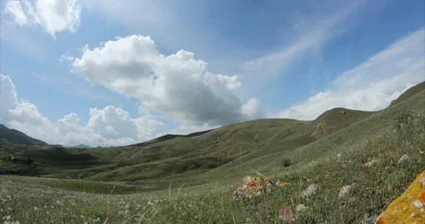 Clouds over the green hills Stock Footage 90042616