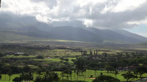 Clouds over green mountain slopes in Kaanapali Stock Footage 38833113