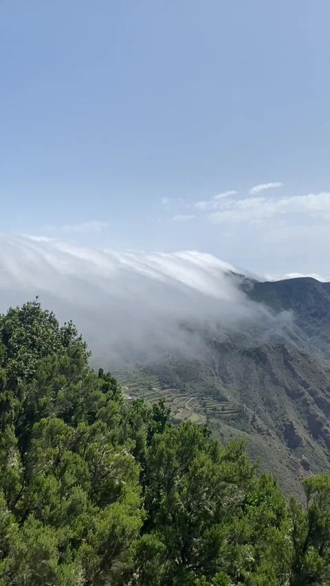 Clouds over green mountains in Anaga Rural Park in Tenerife Stock Footage 309673639