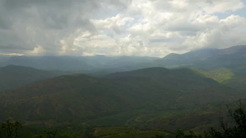 Clouds over green mountains Video stock 79533312