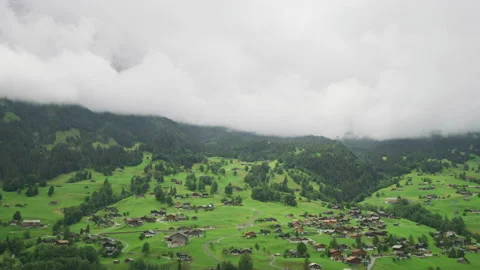 Clouds over Grindelwald village Video stock 219060106